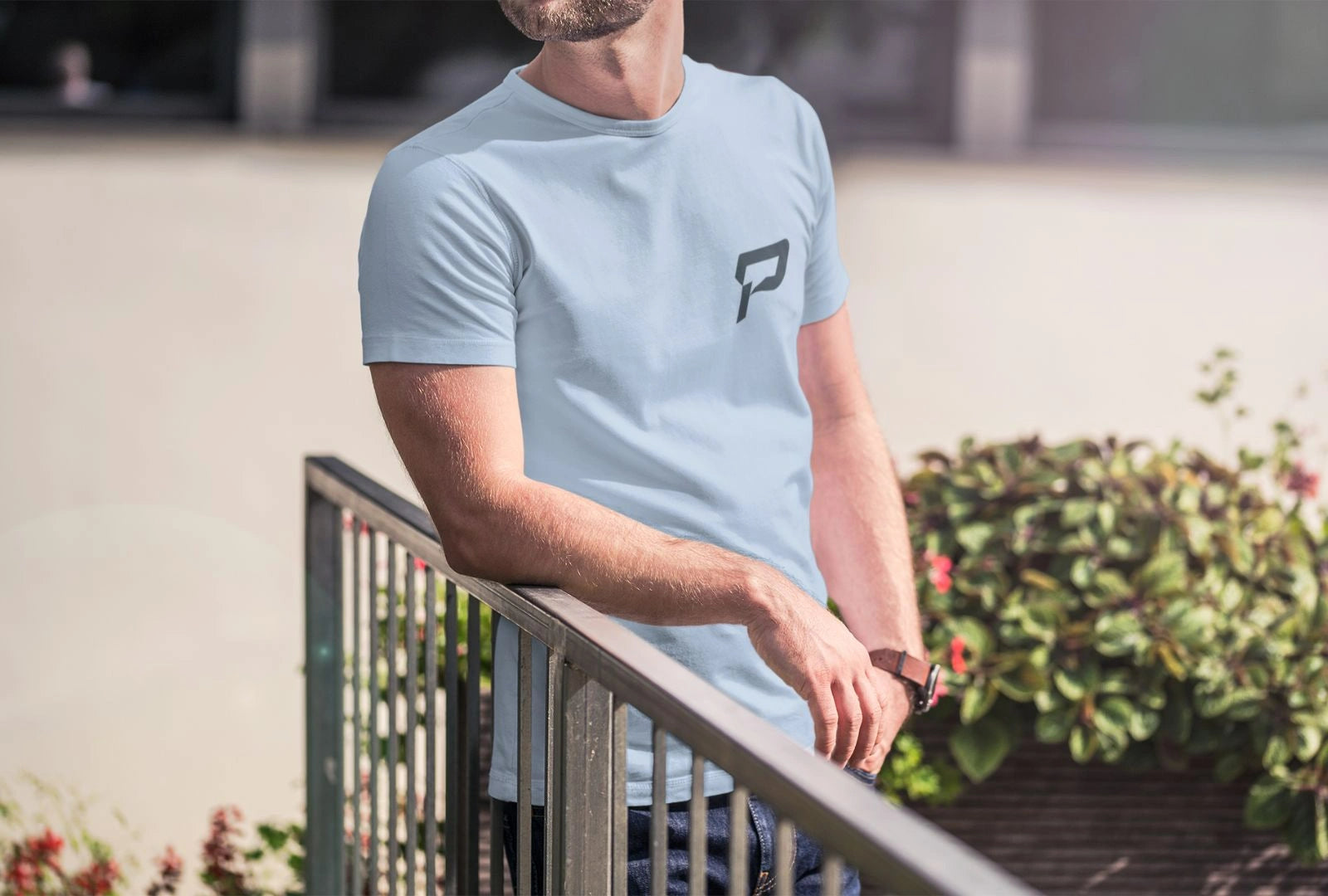 Photo of a man wearing a light blue shirt with PepTalk logo