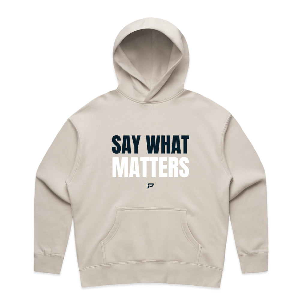 Bone colour women's hoodie with "Say What Matters" design on white background