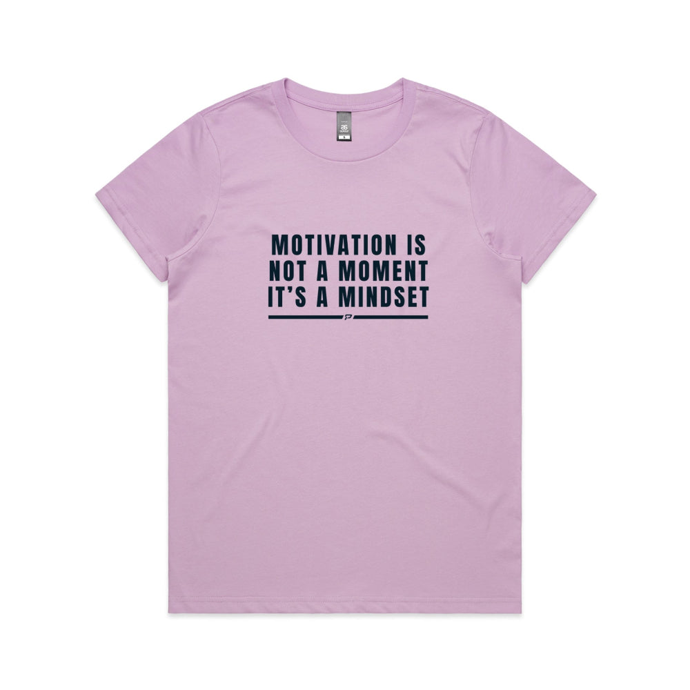 Lavender women's t-shirt with "Motivation Is Not A Moment" design on white background