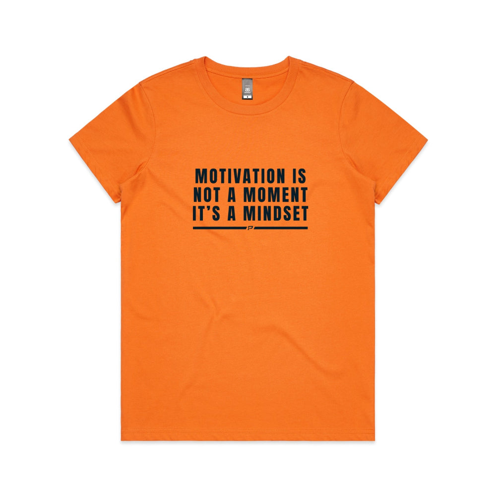 Orange women's t-shirt with "Motivation Is Not A Moment" design on white background