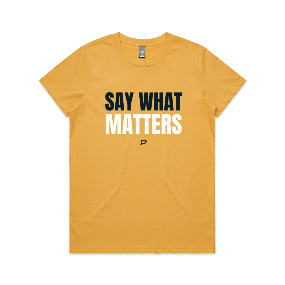 Mustard women's t-shirt with 'Say What Matters' text on a white background