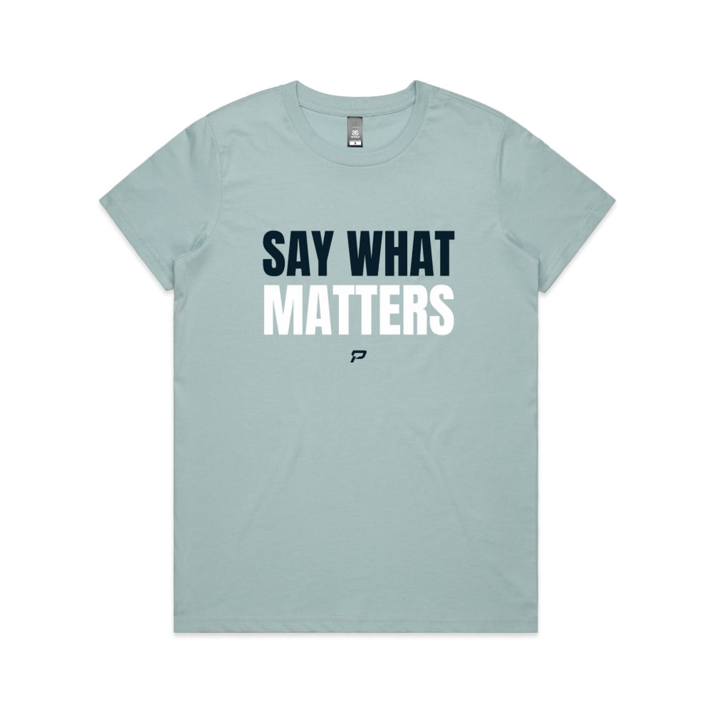 Pale blue women's t-shirt with 'Say What Matters' text on a white background